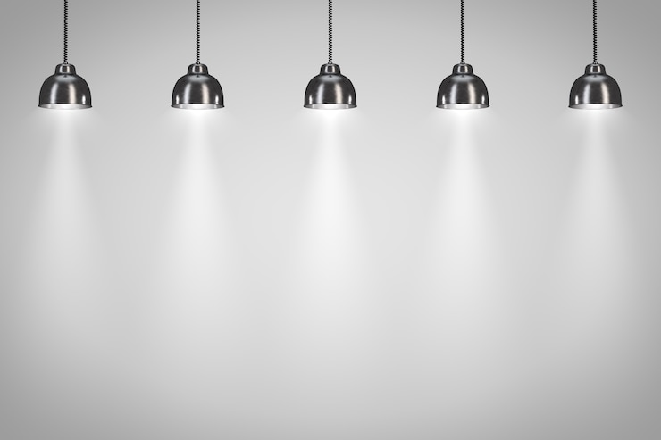 Foto cinco lámparas negras sobre fondo blanco. render 3d.