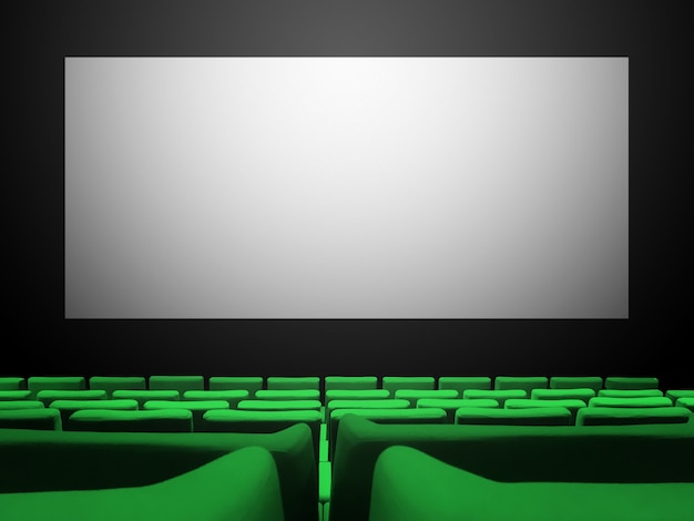 Cine sala de cine con asientos de terciopelo verde y una pantalla en blanco. Copiar el fondo del espacio