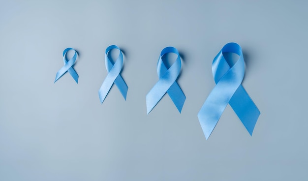 cinta azul para apoyar a las personas que viven y enfermedad cáncer de colon cáncer colorrectal abuso infantil concienciación día mundial de la diabetes Día internacional del hombre