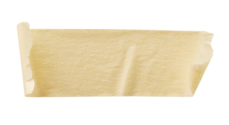 Foto cinta de papel adhesivo amarillo aislado sobre fondo blanco.