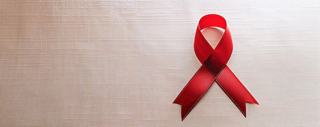 Cinta roja en un fondo texturizado que representa la concienciación por una causa de salud