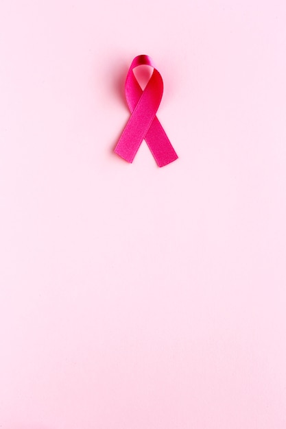 Foto cinta rosa en un color. cáncer