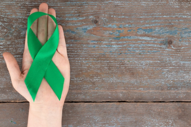 Cinta verde. Escoliosis, salud mental y otros, símbolo de conciencia