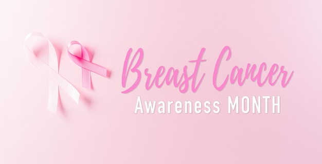 Cintas rosas sobre fondo pastel Símbolo de la concienciación sobre el cáncer de mama en las mujeres Atención médica y concepto médico