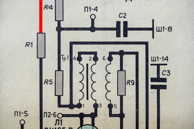 Circuito de rádio antigo impresso em diagrama de eletricidade de papel como pano de fundo para indústrias de eletricidade de educação e reparo