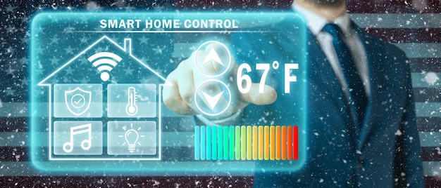 Ciudadano congelado de EE. UU. ajustando la temperatura de calefacción en una pantalla virtual del controlador doméstico inteligente fondo de ventisca de invierno Concepto de ahorro forzado debido al aumento del precio de la calefacción doméstica