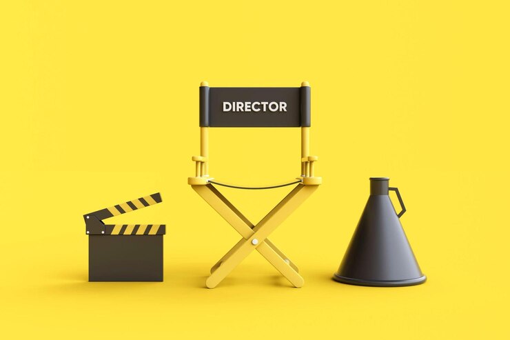 Foto claquete e megafone da cadeira do diretor no fundo amarelo