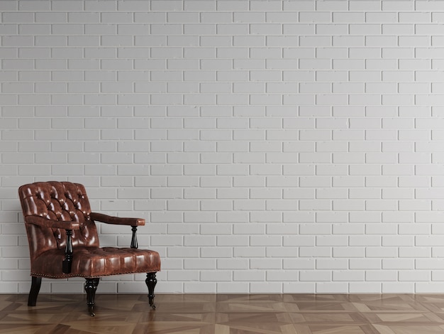 Clásico sillón de cuero marrón rojizo parado frente a una pared de ladrillo blanco