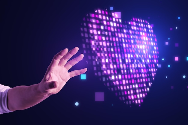 Close-up da mão masculina usando coração de pixel roxo brilhante abstrato em fundo desfocado Cardiologia de saúde e conceito de interface de jogo