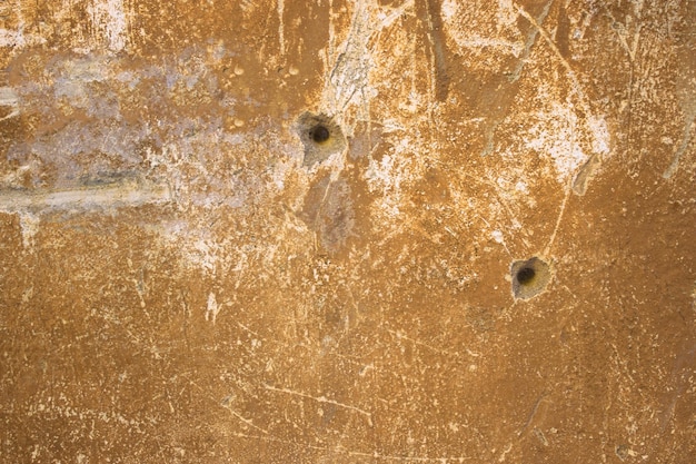 Close up da massa de vidraceiro de textura de superfície de concreto laranja de Wall Street