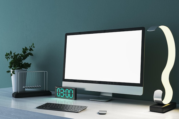 Foto close-up da mesa de designer criativo com suprimentos de monitor de computador simulado branco vazio e vários itens em renderização 3d de fundo de parede de concreto azul