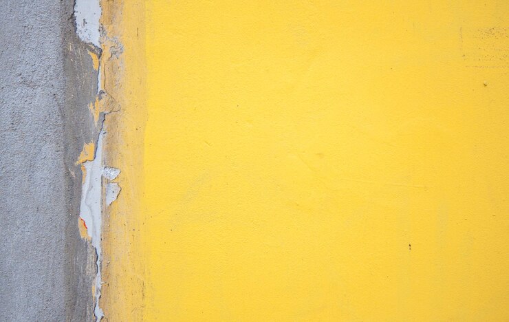 Foto close-up da parede amarela