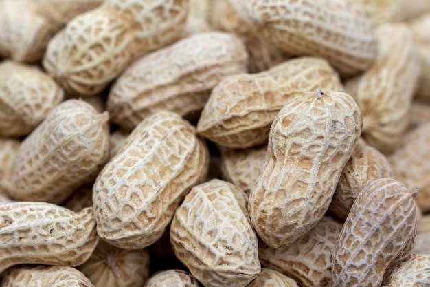 Foto close-up de amendoim assado orgânico lanches saudáveis, deliciosos e crocantes