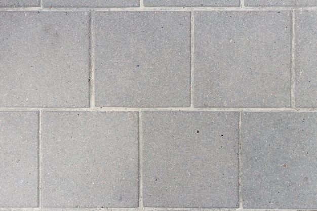 Close-up de lajes de pavimentação cinza. Fundo abstrato