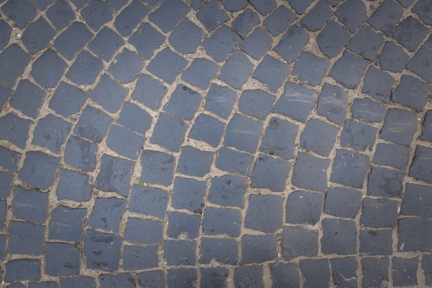 Close-up de lajes de pavimentação cinza. Fundo abstrato