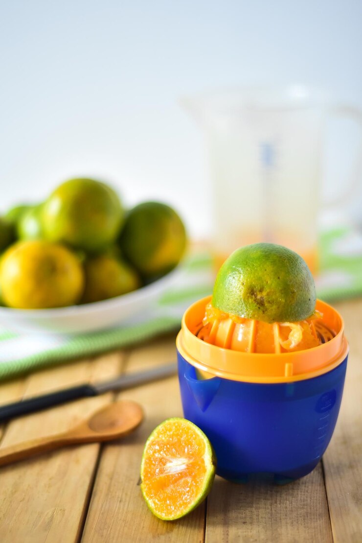 Foto close-up de laranja e sucadora