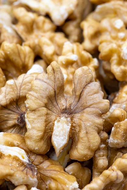 Foto close-up de nozes descascadas fundo de comida snack fresh nuts formato de história