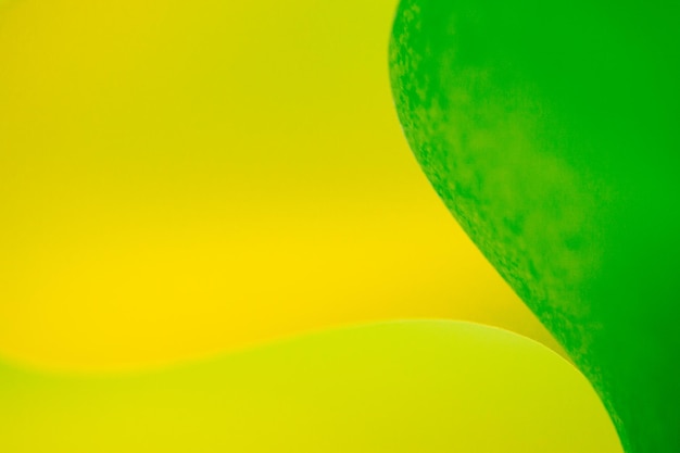 Close-up de papel amarelo e verde