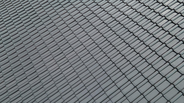 Close-up de telhados pretos queimados na construção do telhado e no conceito de construção
