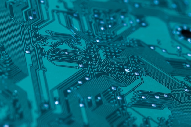 Foto close-up de uma placa de circuito impresso de computador verde