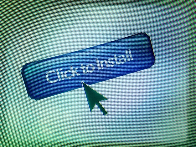 Foto close-up do cursor no ícone de clique para instalar