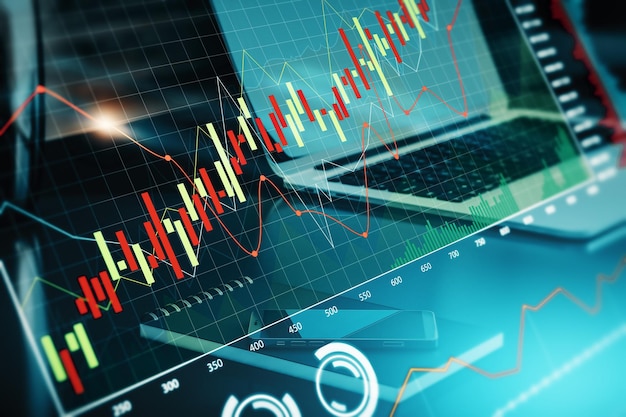 Close-up do local de trabalho com computador portátil e gráfico forex brilhante criativo no fundo desfocado Comércio financeiro e conceito de tendência Renderização em 3D e dupla exposição