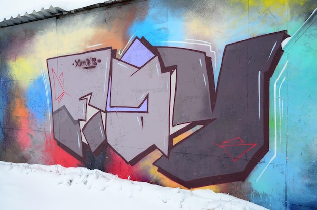 Close-up-Fragment einer Graffiti-Zeichnung, die mit Aerosolfarbe auf die Wand aufgetragen wurde Hintergrundbild einer modernen Komposition von Linien und farbigen Bereichen Straßenkunstkonzept