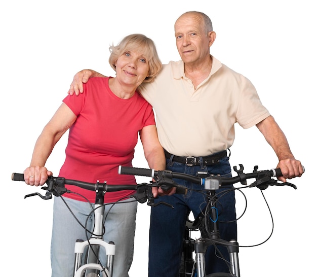 Close-up retrato de una pareja de ancianos abrazos en bicicleta