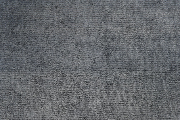 Close-up tiro de textura de pano de microfibra cinza para fundo