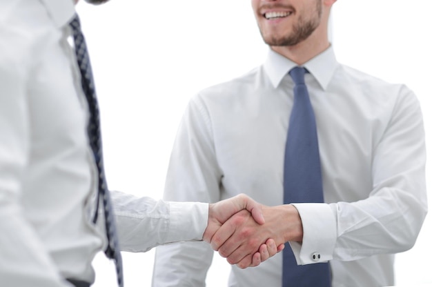 Close upBusiness-Handshake von Geschäftsleuten auf hellem HintergrundKonzept der Partnerschaft