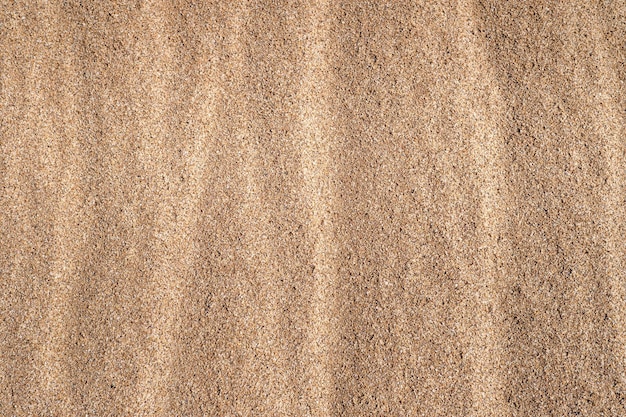 Closeup arena en la playa utilizando como fondo