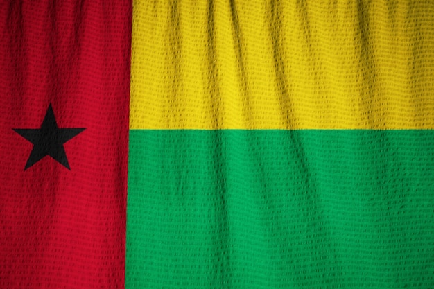 Foto closeup, de, babados, bandeira guiné-bissau, guiné-bissau, bandeira, soprando, em, vento