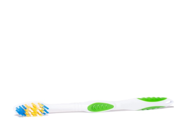 Foto closeup de escova de dentes isolado em um fundo branco