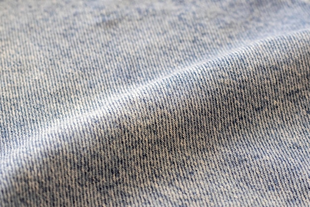 Closeup de jeans azul claro com uma onda Copiar espaço para texto Design para texto