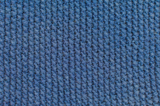 Closeup de textura de malha Fundo têxtil cor azul em tons