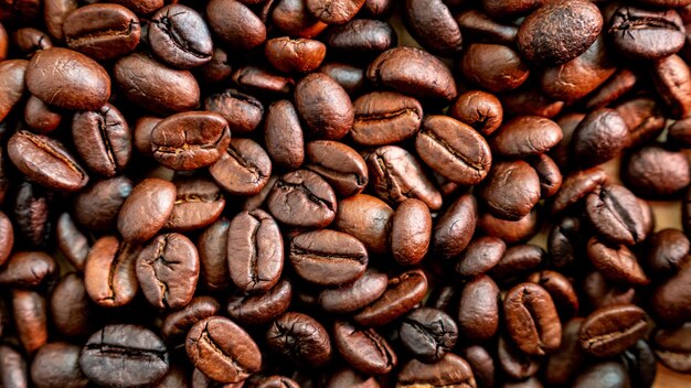 Foto closeup geröstete kaffeebohnen hintergrund