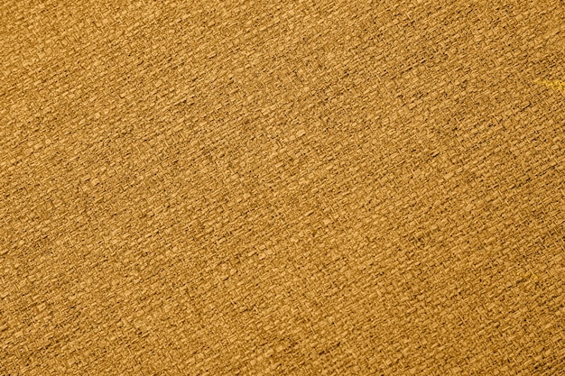 Closeup macro de textura de tecido de fundo laranja