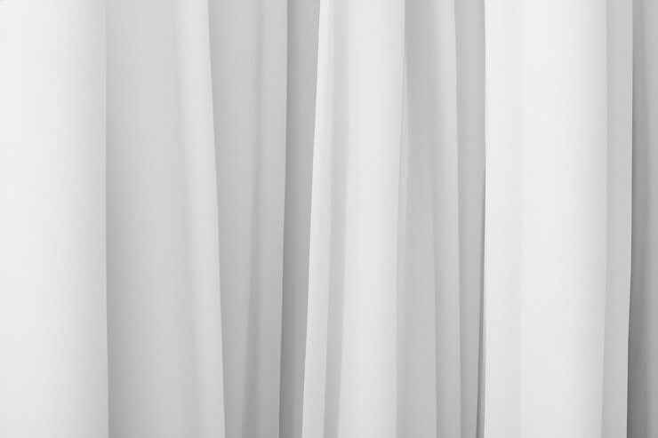 Foto closeup of white sheer curtains with soft flowing folds