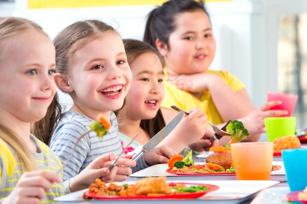 Closeup view Children Eating School Dinners concept