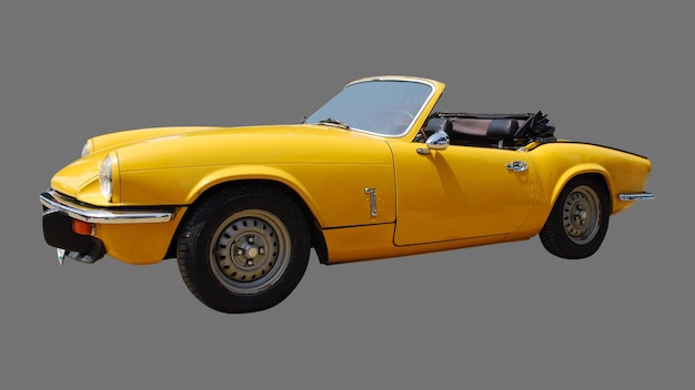 Coche Oltimer cabriolet recorte color amarillo con fondo gris