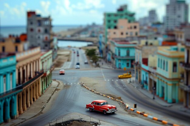 Foto un coche rojo conduciendo por una calle al lado de edificios altos