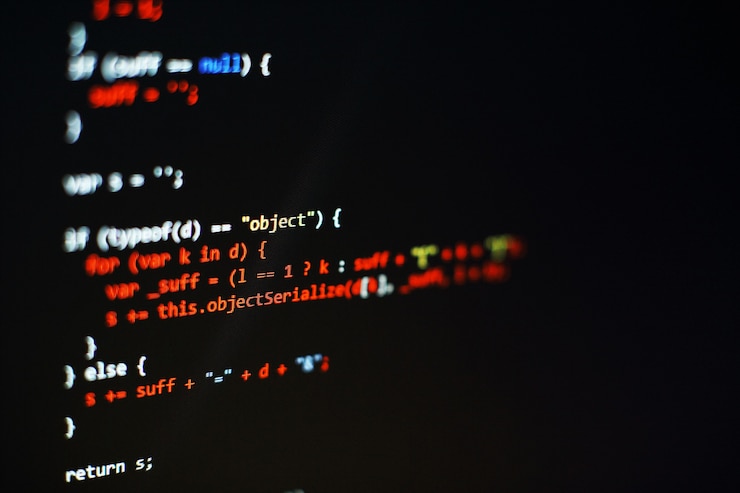 Foto código de programación del desarrollador de software. código de script de computadora abstracto. enfoque selectivo