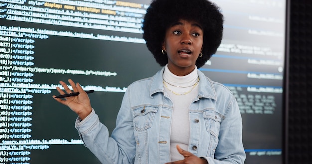 Coding lecture student and woman teaching education and learning in ai course African person class and study programming in university with data for software development in presentation on screen