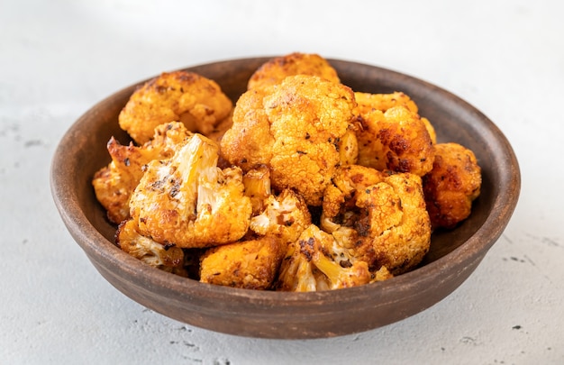 Cogollos de coliflor con pimentón al horno en el tazón