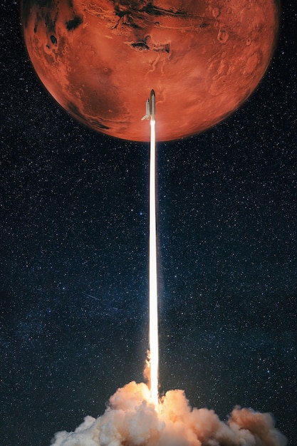 Foto el cohete espacial despega hacia el planeta rojo marte. lanzamiento exitoso del transbordador espacial.