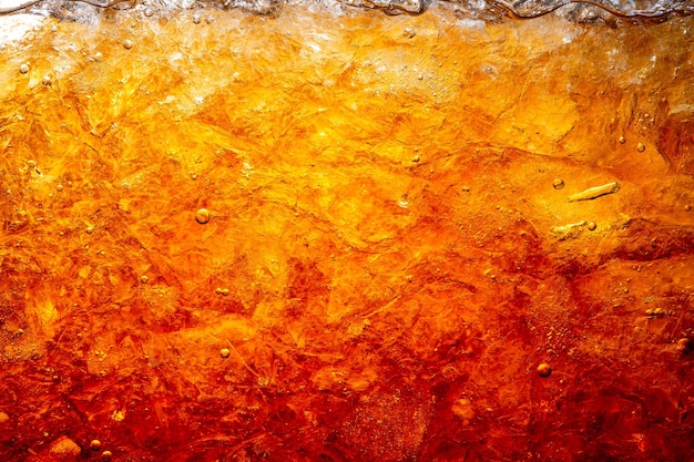 Cola com fundo de comida de gelo Elemento de design de closeup de cola Macro de bolhas de cerveja
