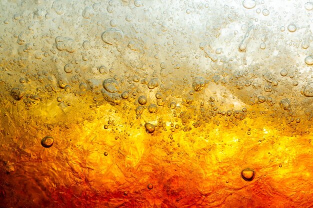 Cola mit Ice Food Hintergrund Cola Nahaufnahme Gestaltungselement Bier sprudelt Makro