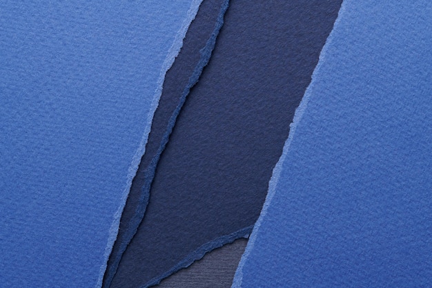 Colage artístico de pedazos de papel rasgado con bordes rasgados Colección de notas pegajosas colores azules fragmentos de páginas de cuadernos Fondo abstracto