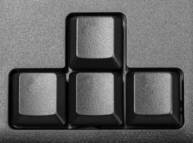 Colección electrónica - flechas de bloques de detalles en el teclado de la computadora negra