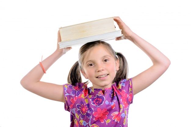 Colegial com livros na cabeça